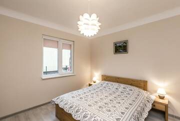 Фото номера Дом с 2 спальнями Дома для отпуска Pinetree Inn г. Елгава 45