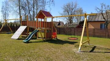 Фото номера Дом с 2 спальнями Дома для отпуска Pinetree Inn г. Елгава 57