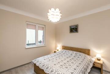 Фото номера Дом с 2 спальнями Дома для отпуска Pinetree Inn г. Елгава 12
