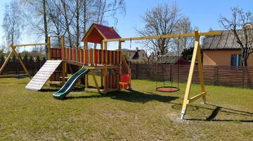 Фото номера Дом с 2 спальнями Дома для отпуска Pinetree Inn г. Елгава 32